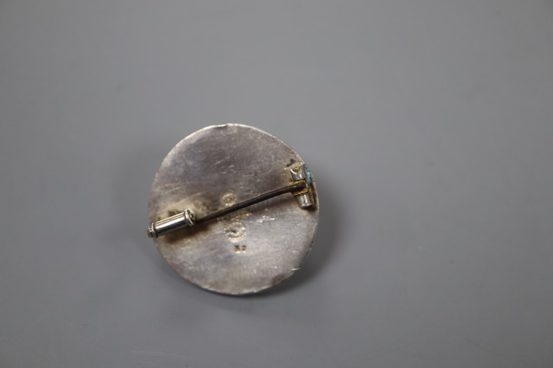 A pre 1932 Georg Jensen 830S and cabochon set circular brooch, design no. 52, 28mm, gross 7 grams.